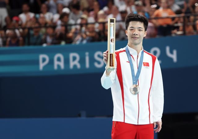 在线投注买球-从东京的替补到巴黎摘铜 严浪宇有遗憾也有收获